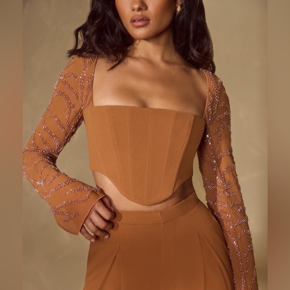 the Astra corset crop top is the perfect separate piece for your party wardrobe.